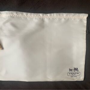 COACH medium size, cream, color, drawstring satiny feel dust bag LNWOT
